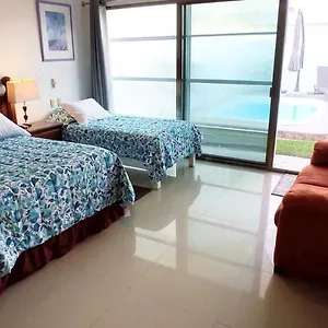 Quarto em Acomodações Particulares Casa Abril Cozzy Suites, Cancún